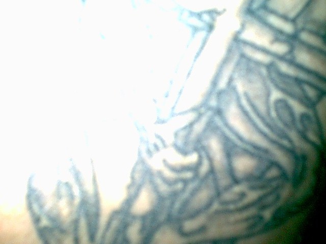 wyatttakingphotoofmytat.JPG